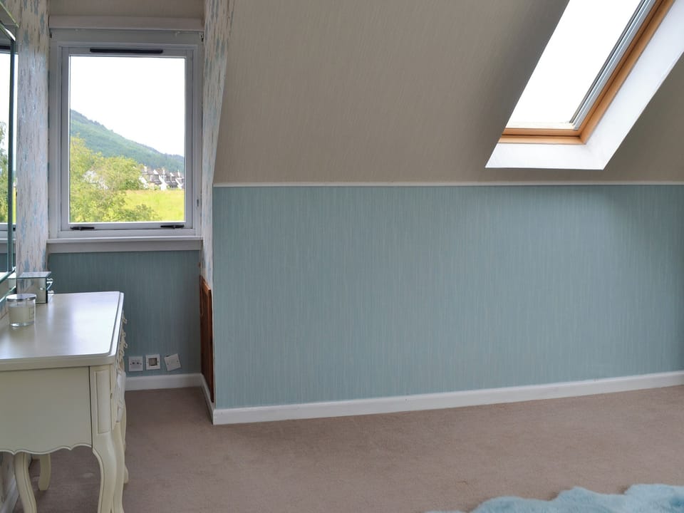 Tastefully decorated bedroom with scenic views | River Mill House, Ballachulish, near Fort William