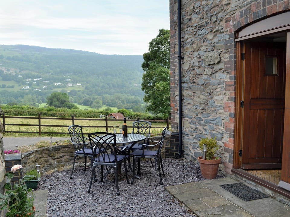 Relaxing sitting-out-area | Bwthyn Clyd, Llangollen, near Wrexham