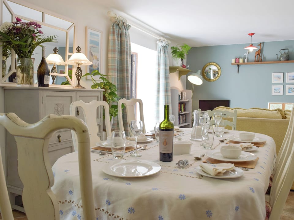 Elegant dining space | Mill Cottage - Pendegy Mill, Llanybri, near Carmarthen