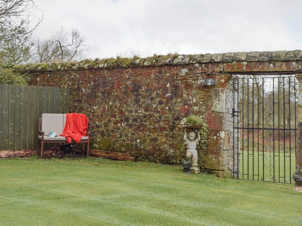 Peaceful sitting out area in garden | Nether Cottage, Kinneddar Cottage - Nether Kinneddar Lodge Cottages, Saline, near Dunfermline