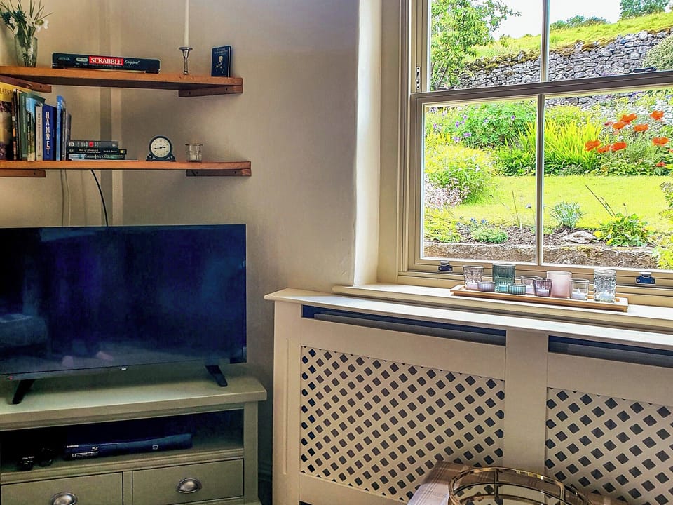 Garden views from comfortable living room | Penny Cottage, Bonsall, near Matlock