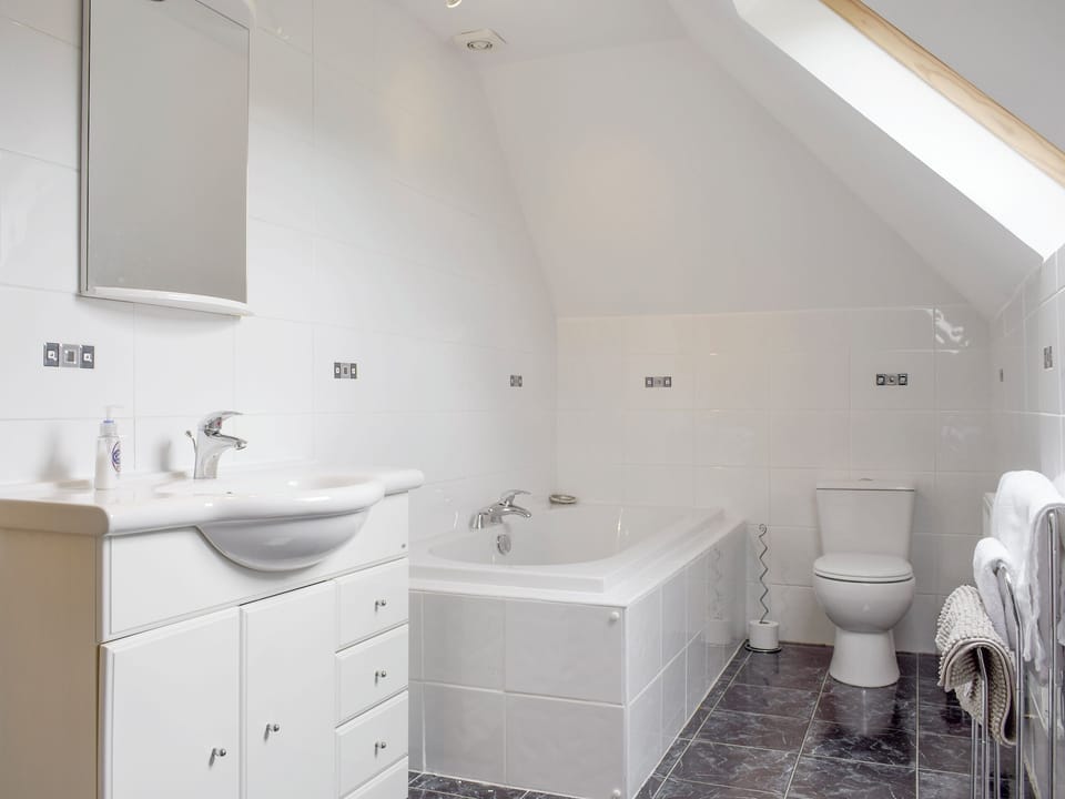 Family bathroom with separate bath and shower cubicle | The Stables - Loch Lomond Farm Cottages, Balfron Station, near Stirling