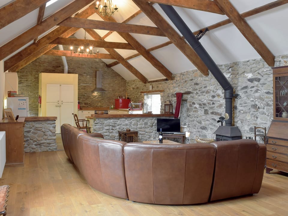Well presented open plan livin space with beamed ceiling | Upper Farms Barns - Swallow Lodge - Upper Farm Barns, Mathry, near St Davids