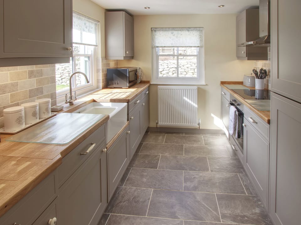 Well-equipped fitted kitchen | Fferam Gorniog, Holyhead Mountain, near Trearddur Bay