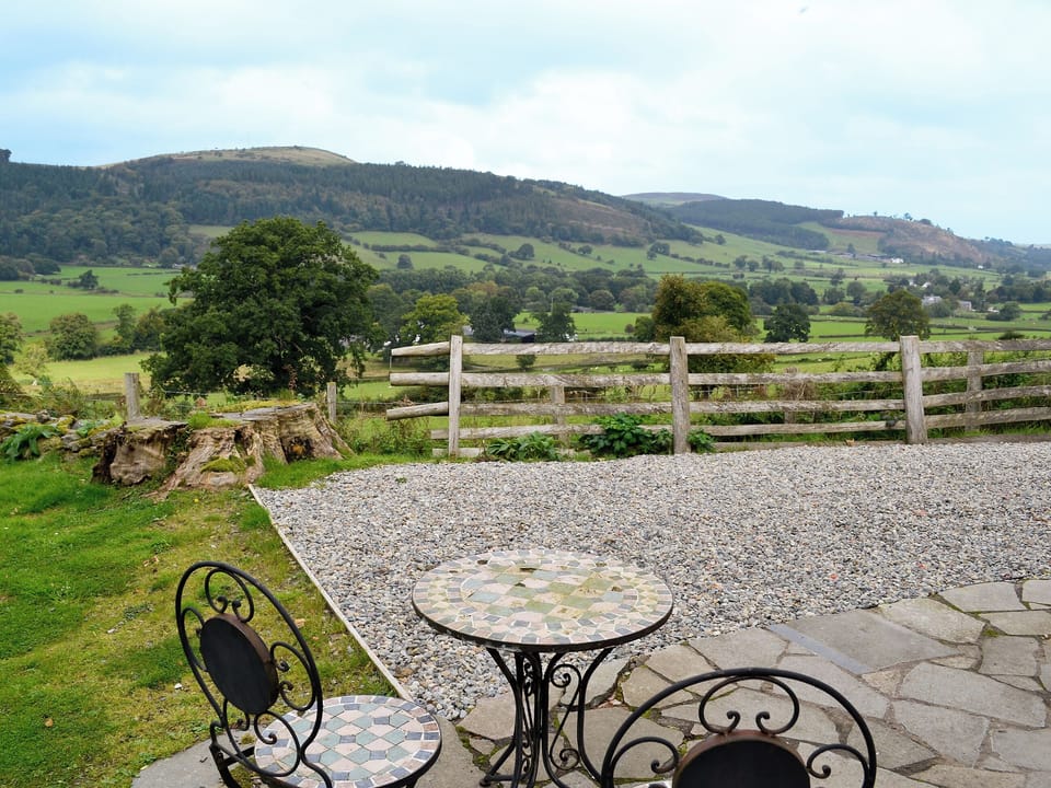 Sitting-out-area with countryside views | Crogen Bryn Awel, Bala