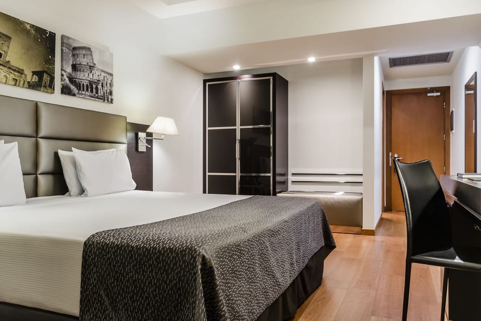 Double or Twin Room | Down comforters, minibar, in-room safe, desk