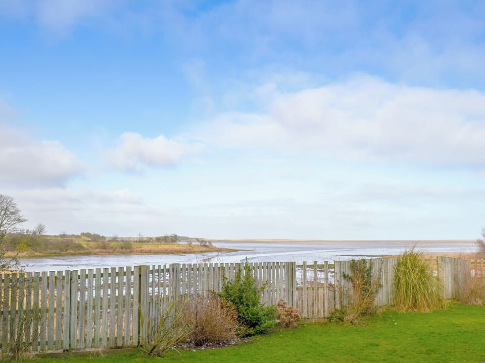 Delightful garden overlooking the bay | The Maltings, Near Bamburgh