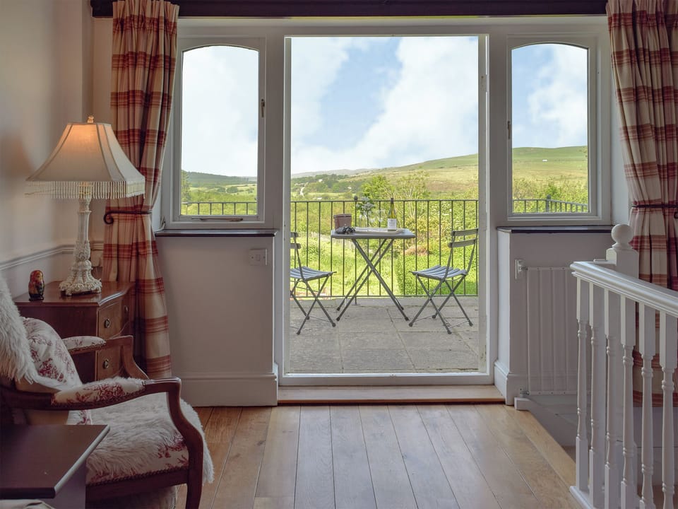 Delightful living room leading to balcony area | Y Teras, Rosebush, near Narberth