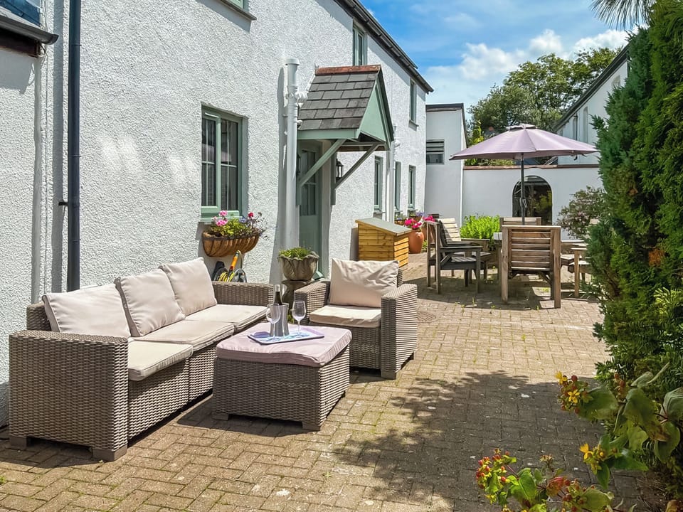Patio area with outdoor furniture | Barfield&rsquo;s Cherry Tree Cottage, Canworthy Water, near Crackington Haven