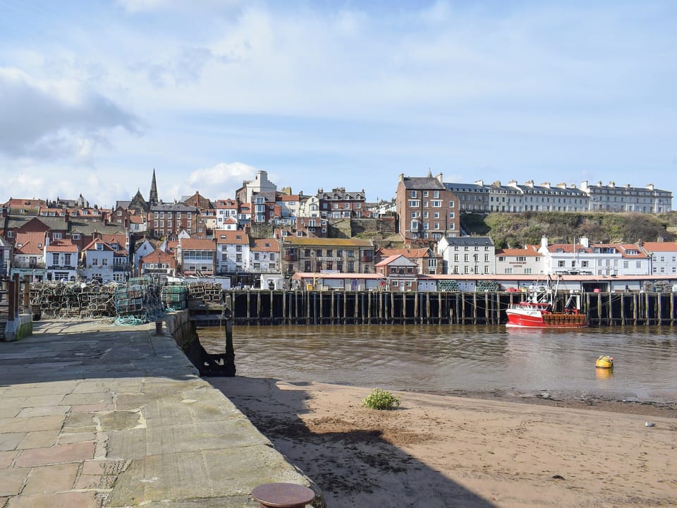 Spacious family bedroom with a double and a single bed | Cor Cottage, Whitby