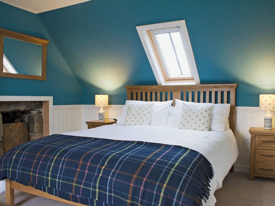 Attractively decorated double bedroom with kingsize bed | Ethel&rsquo;s House, Armadale, near Bettyhill