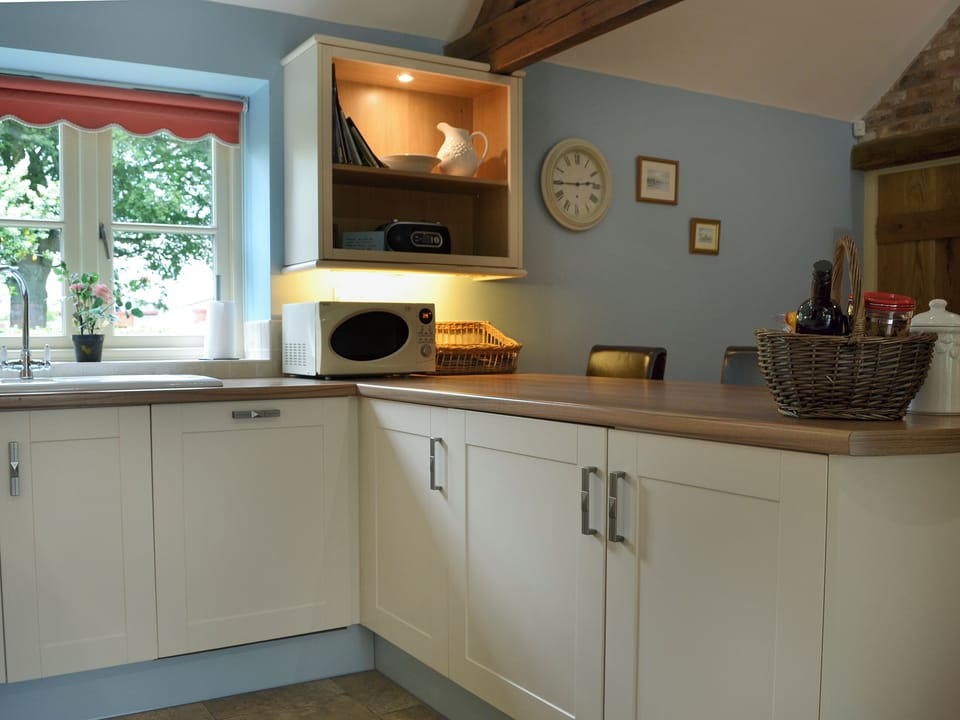 Immaculately presented kitchen area | Woldsend Holiday Cottages: Rose Cottage - Woldsend Holiday Cottages, Rillington