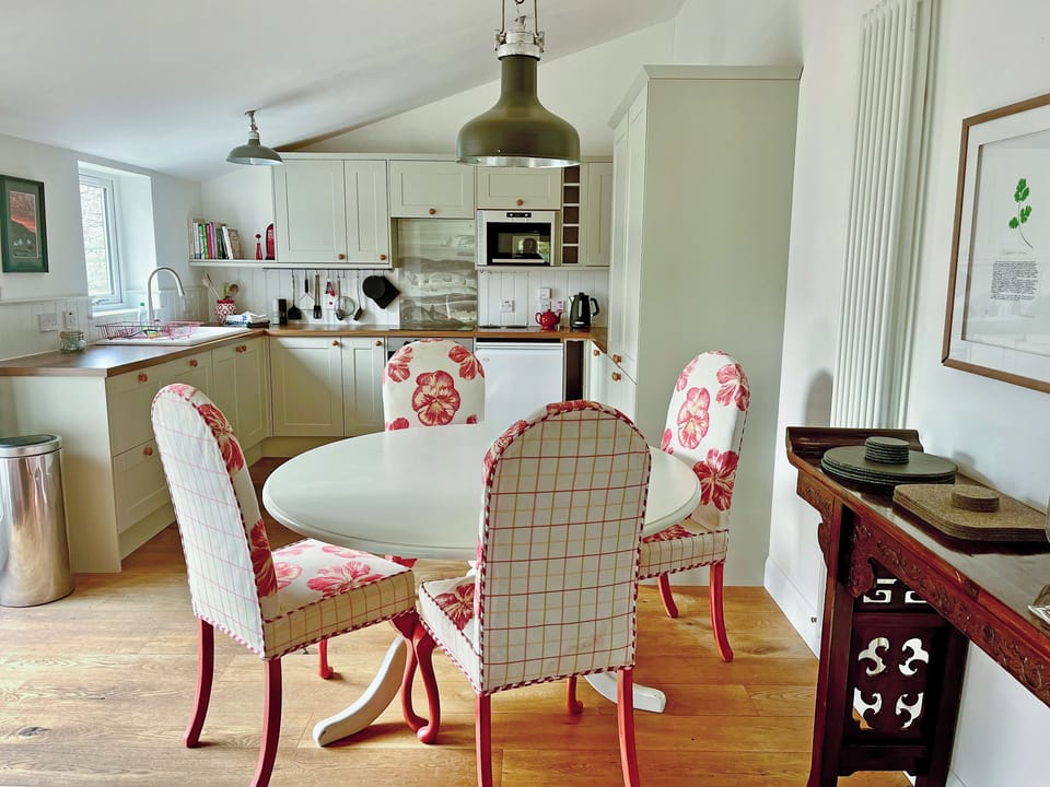 A fully equipped kitchen with comfortable dining chairs | The Byre - Rispond Estate, Rispond, near Durness