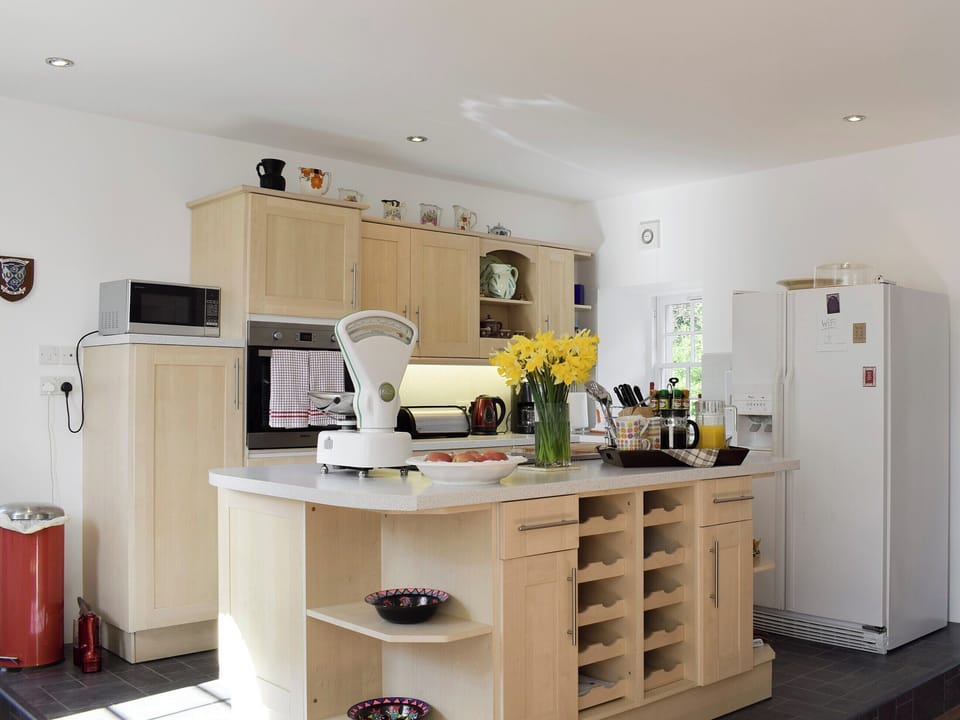 Lovely kitchen area with useful &lsquo;island&rsquo; | The Stables, Pitcairlie, near St Andrews