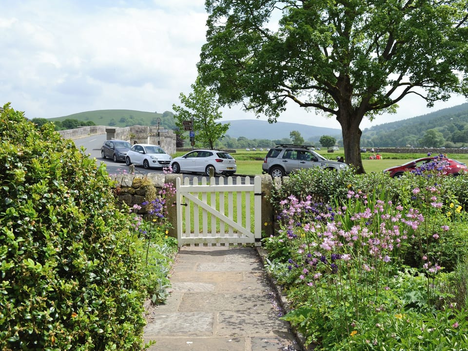 Garden and great views | Clematis Cottage, Burnsall