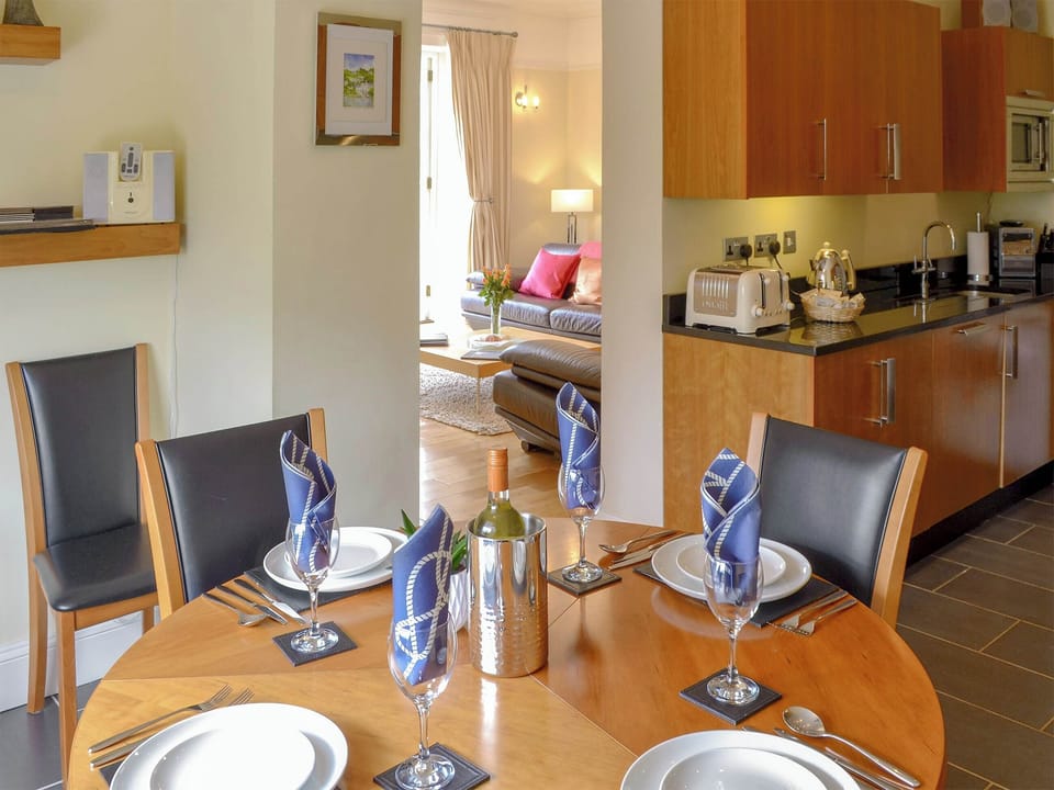 Well equipped kitchen/ dining area | Carnethic HouseOne Acre View, Fowey