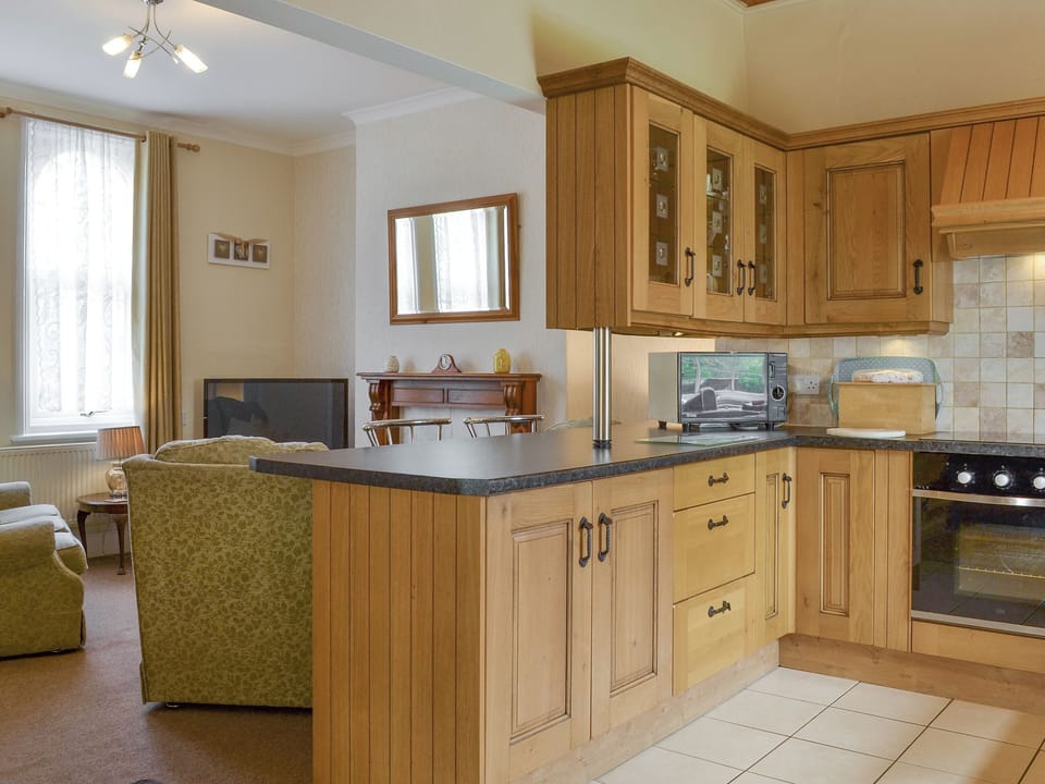 Open-plan living room and kitchen | The Gatehouse - Eldin Hall Cottages, Scarborough