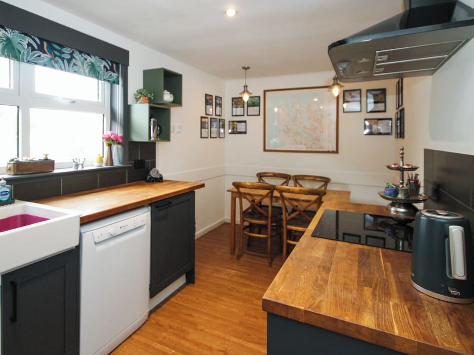 Contemporary kitchen and dining area | Mackenzie Cottage, Poolewe, near Gairloch
