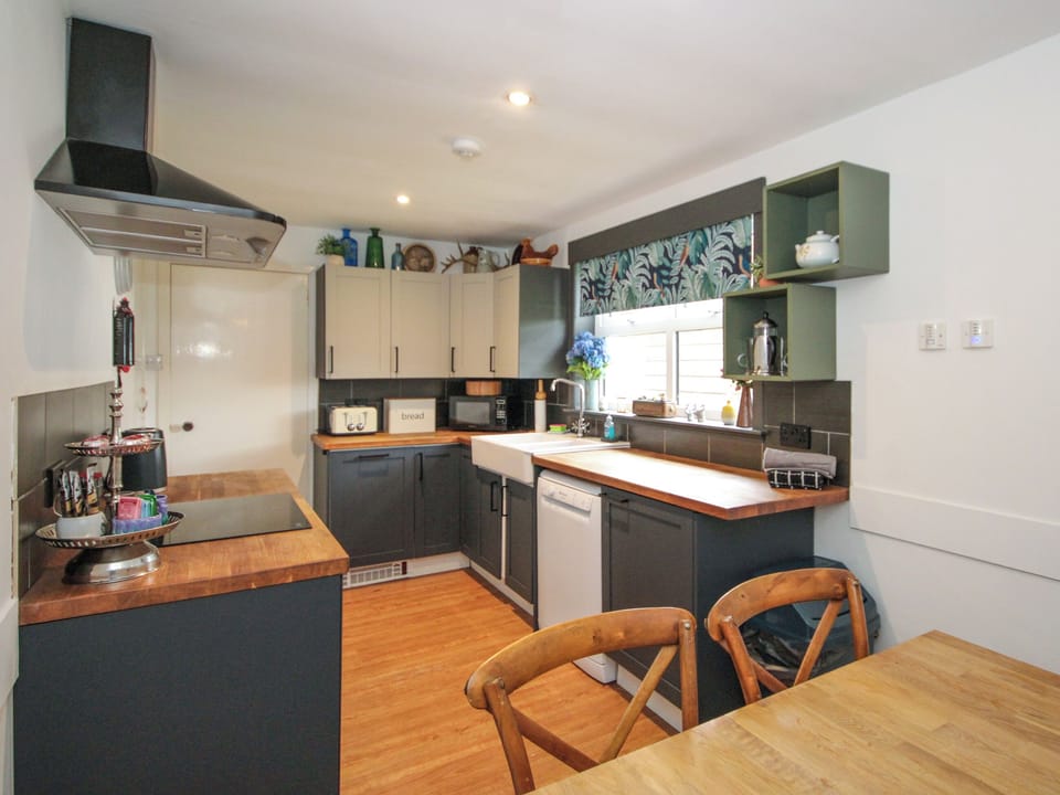 Contemporary kitchen and dining area | Mackenzie Cottage, Poolewe, near Gairloch