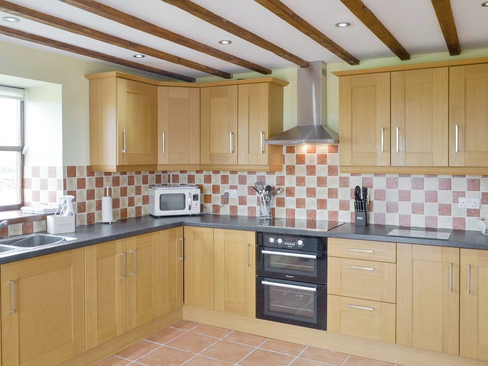 Fully-appointed kitchen | Llofft Storws - Bronallt Barns, Llanynghenedl, near Holyhead