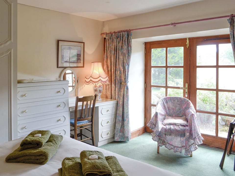 Ample storage within double bedroom | Rowan Tree Cottage, Glenisla