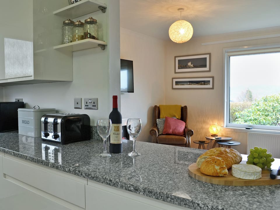 Stylishly furnished open plan living space | Summit, Oban