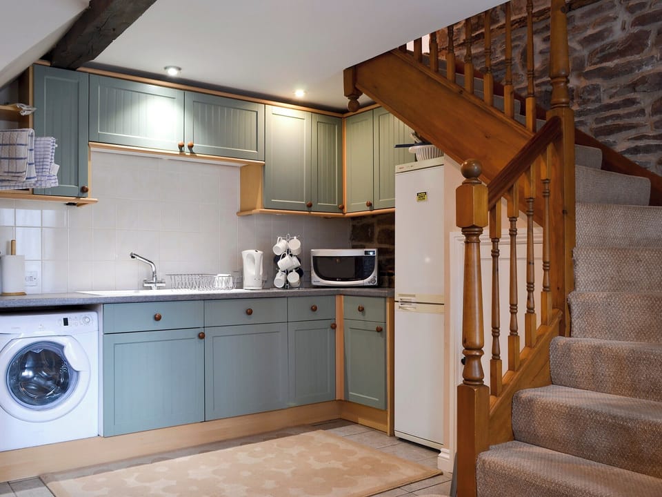  Beamed, well-equipped kitchen | Stoke Court Farm Barn, Stoke St Milborough, near Ludlow
