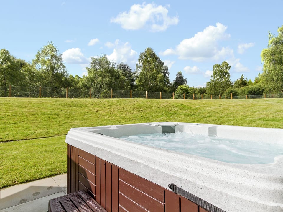 Enjoy a soak in your own private hot tub | Birch Corner, Aviemore