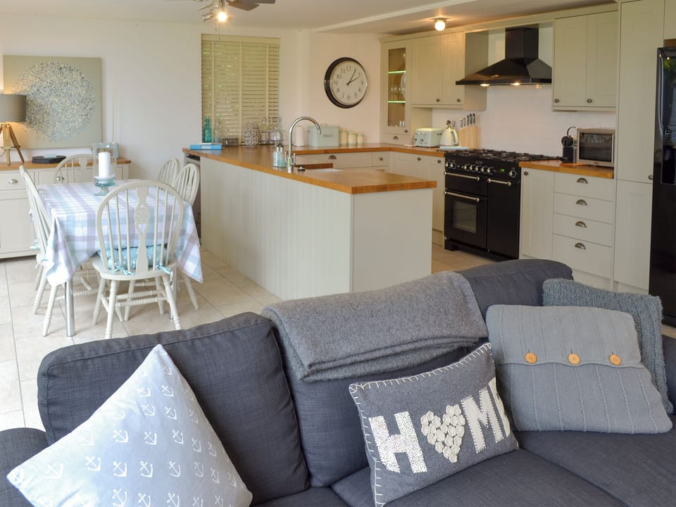 Open-plan living space with dining area, lounge and kitchen | The Old Smithy, Penelewey, near Truro