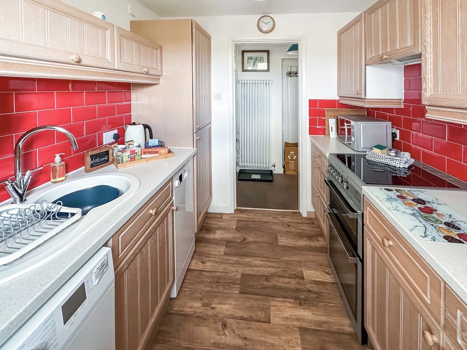 Well equipped galley kitchen | Borrowdale Cottage, North Stainmore, Kirkby Stephen