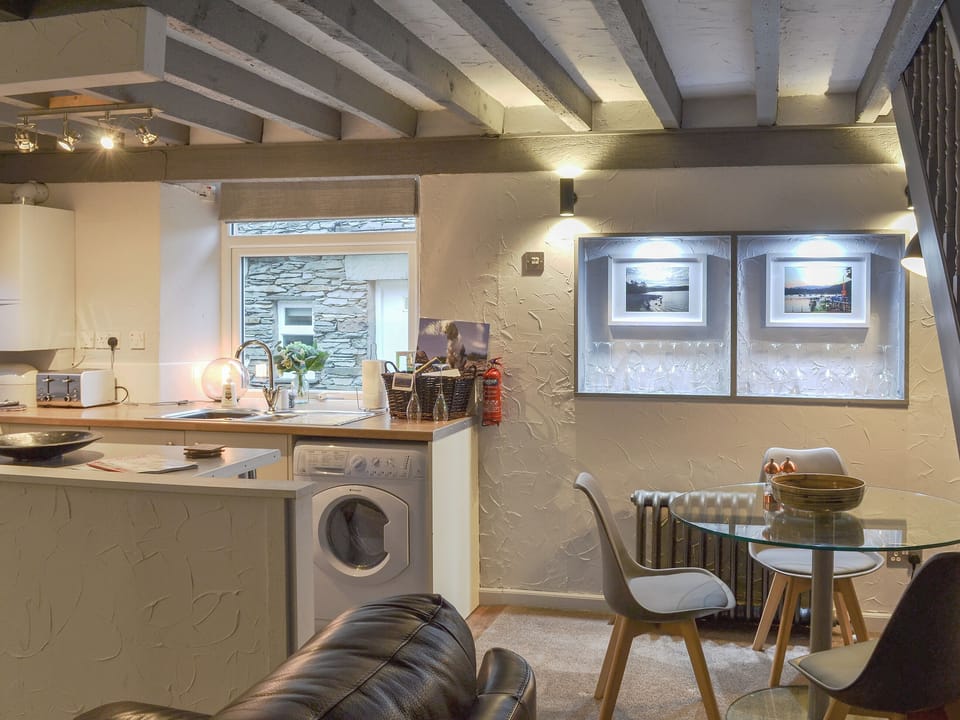 Open plan living space with beamed cieling | Stables Grasmere - Grange End Cottages, Grasmere