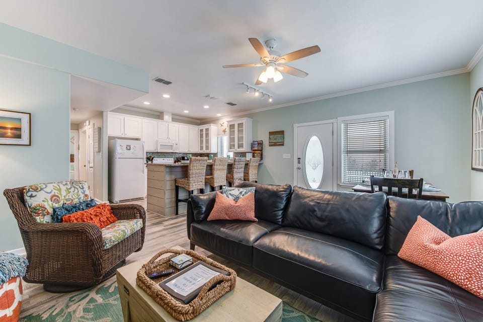 Interior - Flowing kitchen, dining, and living area