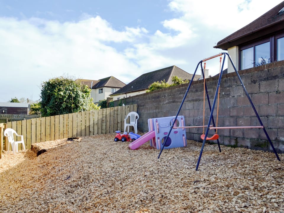 Children&rsquo;s play area in the garden | Park View Cottage, Stranraer