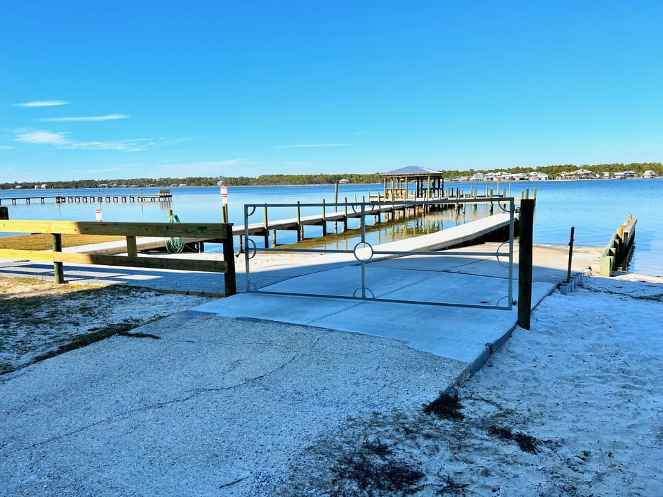 Beautifully renovated. Lagoon Facing Pool, Tennis Courts, Fishing Pier and Boat Launch at Gulf Shores Surf & Racquet, 1 Bedroom 1 Bathroom, Sleeps 4. Managed by Island Rentals
