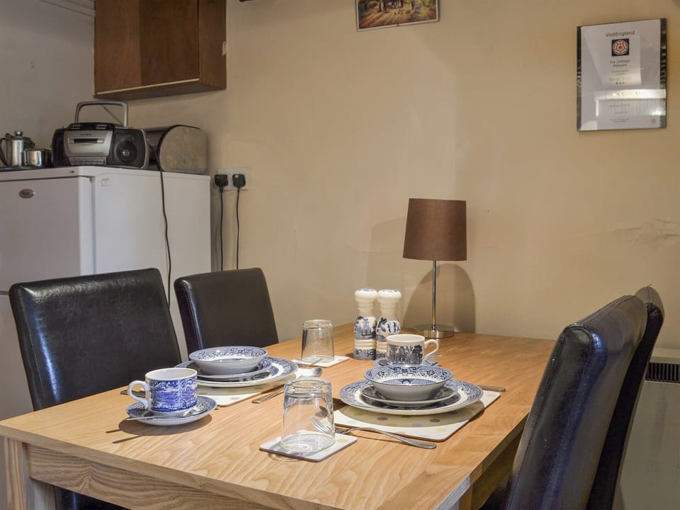 Intimate dining area | Ivy Cottage, Aldwark, near Matlock