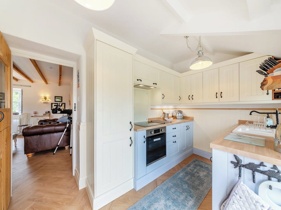 Farmhouse style kitchen with tiled floor | Lake View Cottage, Yarrow Moor, near Bellingham