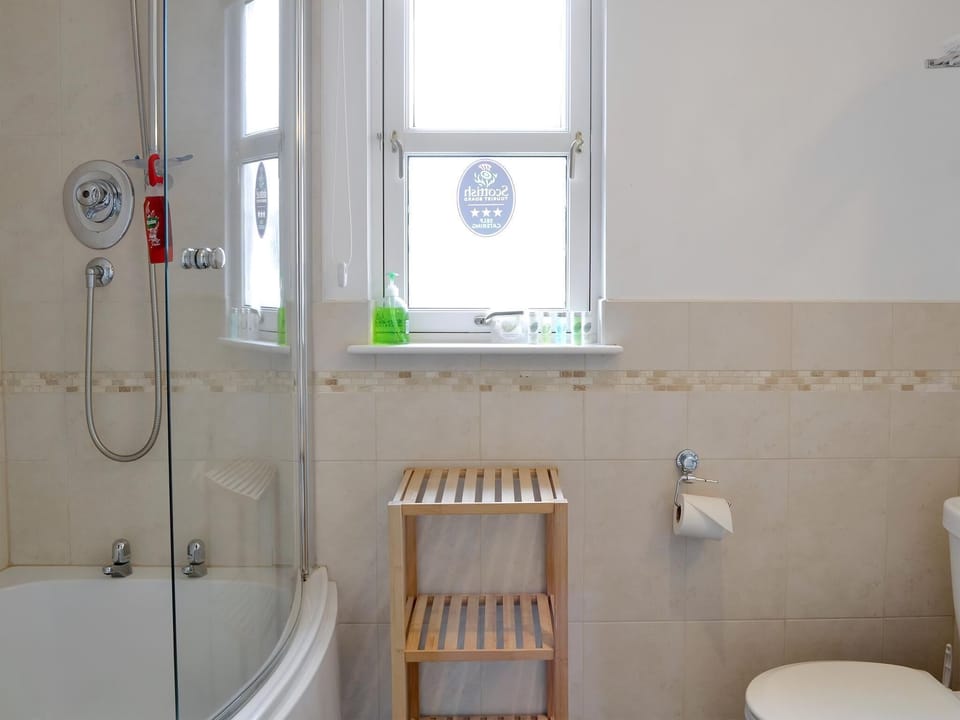 Family bathroom with shower over bath | No 32 - Queens Court, Inchmarlo, near Banchory