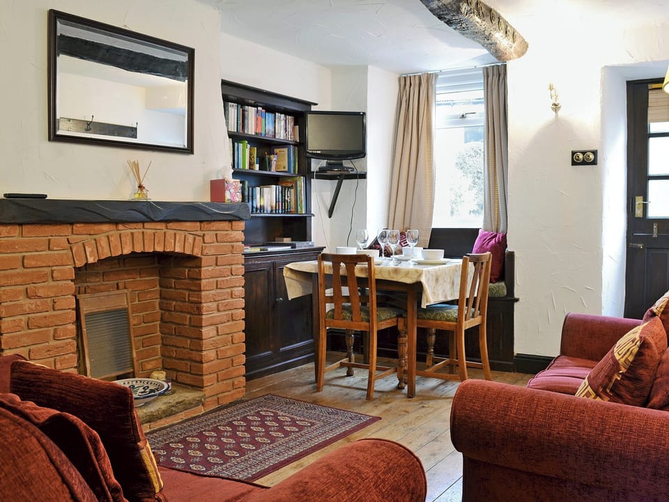 Warm and welcoming living room with beams | Michill Cottage, Castleton, near Buxton