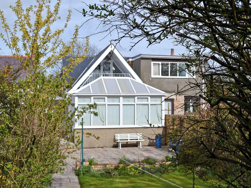 Exterior of the rear with conservatory | Lottie&rsquo;s Place, Seahouses