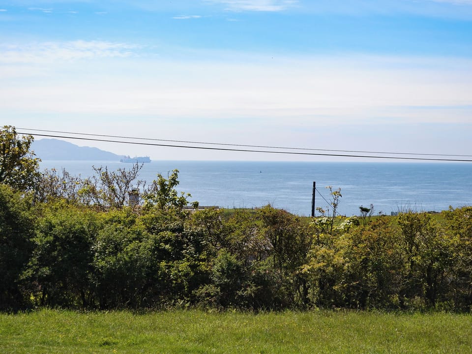 Holyhead mountain view, with ferries to Ireland | Seafield, Church Bay, Anglesey