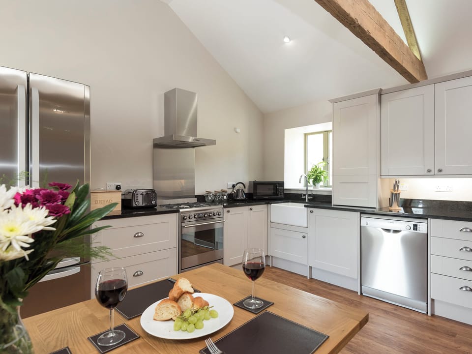 Well-equipped kitchen with dining area | Property 2 - Rew Farm Barns, Ventnor