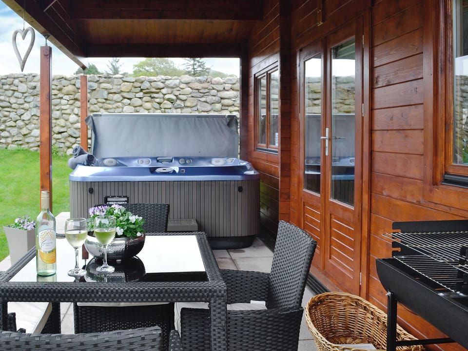 Decking area with hot tub, sitting out area, bar-b-q | Ty Pren, Dyffryn Ardudwy, near Barmouth