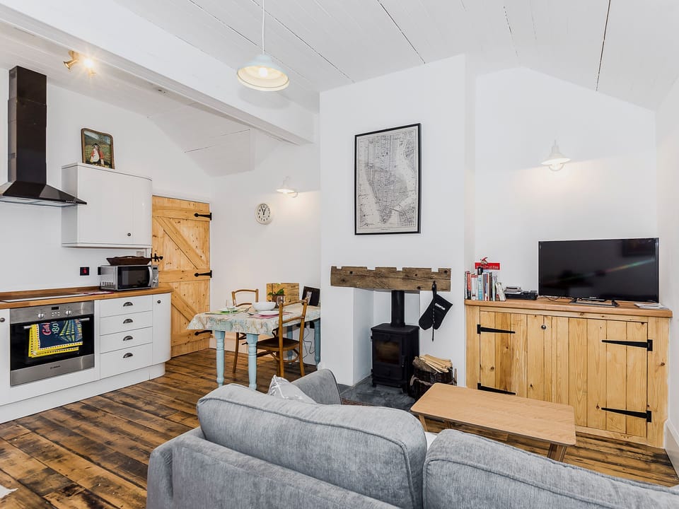 Beautifully finished Contemporary open plan living room, kitchen and dining area | Ty&middot; Sam - Ty Coch Chatham, Llandwrog, near Caernarfon