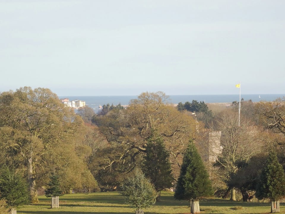 The impressive Powderham castle just across the River Kenn | Blackberry Cottage, Kenton, near Exeter