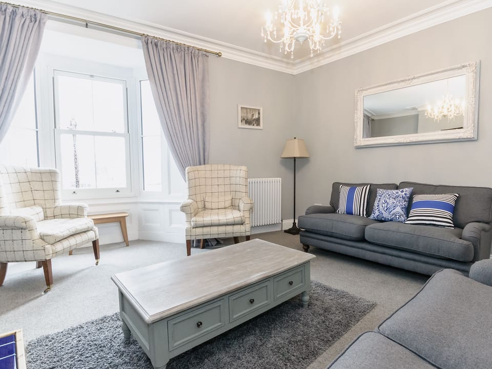 Second living room with large windows with view accross Whitby and the harbour | Frankland House, Whitby
