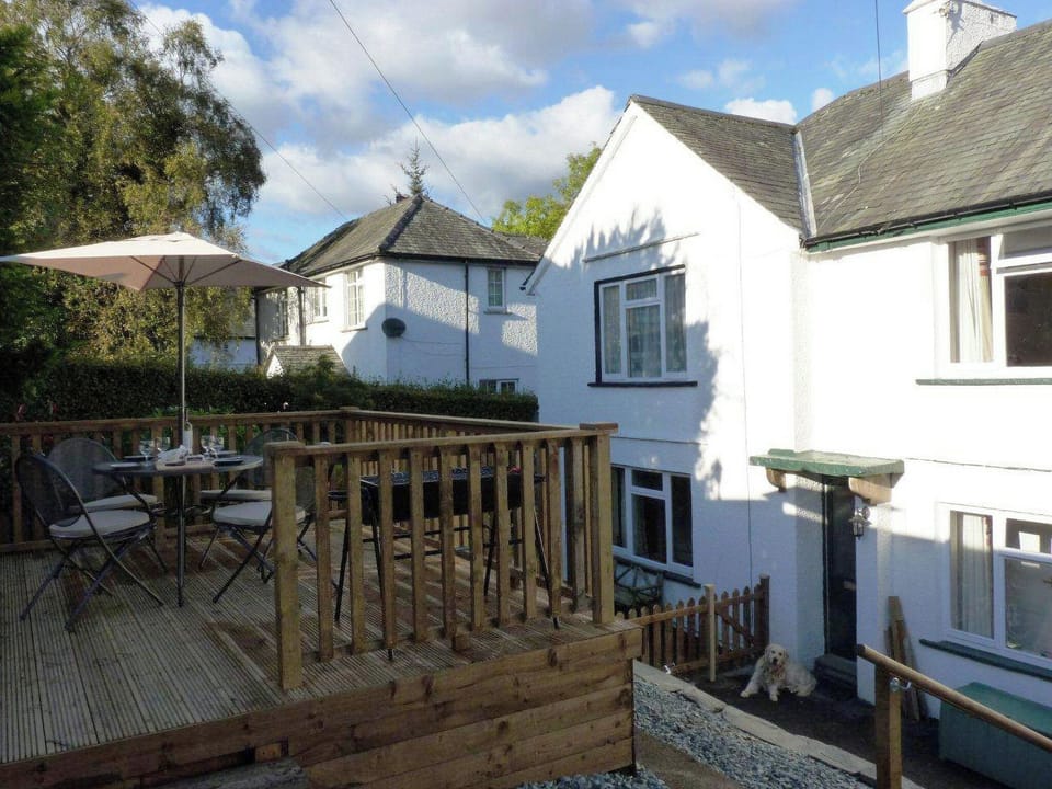 Decked sitting out area | Riverbank Cottage, Keswick