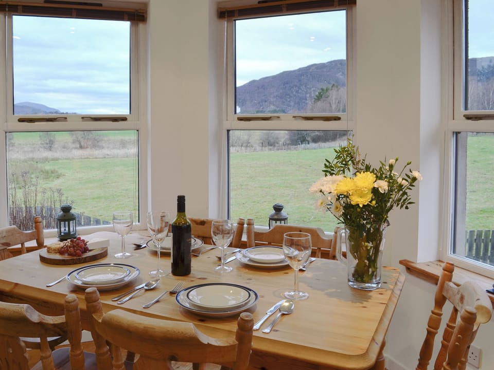 Light and airy dining area in the sun room | Birch Tree Cottage, Aviemore, Speyside
