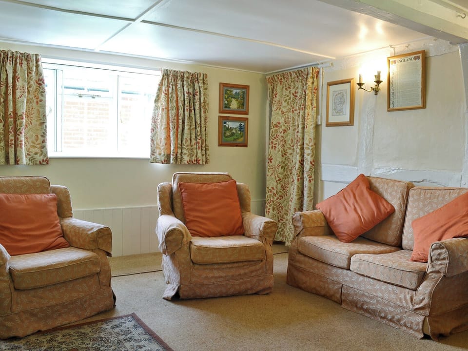 Light and sunny living/dining room with open fire | October Cottage, Aughton, near Marlborough