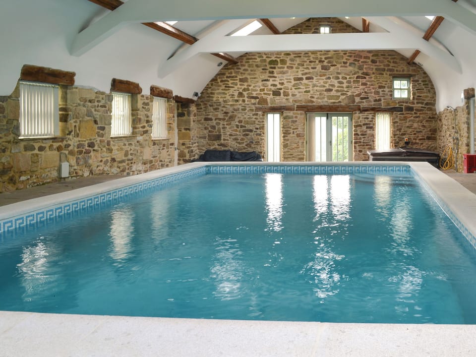 Inviting swimming pool and hot tub | Bowlees Holiday Cot, Wolsingham, near Stanhope