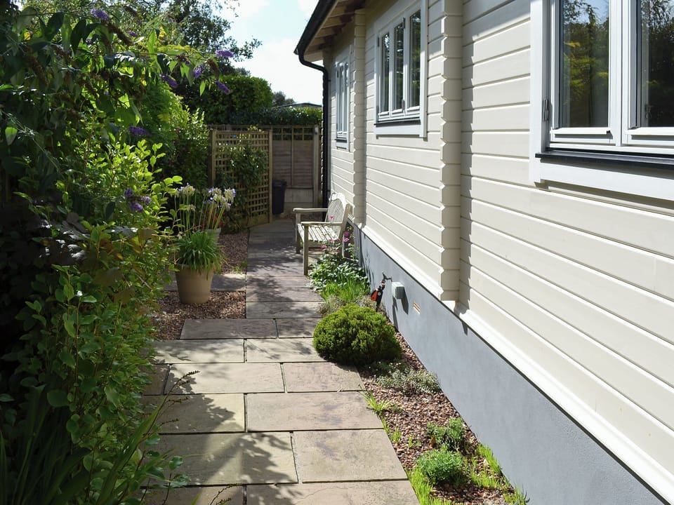 Paved patio area to the side | Wheal Metal Lodge, Poldown, near Helston